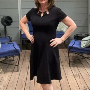 AGB Black short sleeve dress with decorative bodice, Size 10